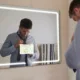 Aquadom Vision 48" x 32" Smart LED Lighted Bathroom Mirror With Built-in TV and Defogger - Image 4
