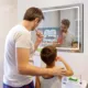 Aquadom Vision 48" x 32" Smart LED Lighted Bathroom Mirror With Built-in TV and Defogger - Image 24